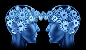 Image of two heads communicating